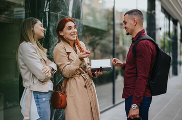 Dynamic urban business team collaborating and brainstorming for success.