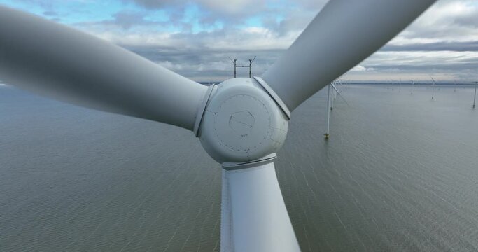Offshore wind turbine wind park. Aerial drone view.