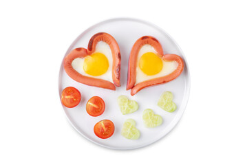 Fresh breakfast with fried sausage with fried egg in the form of heart for Valentine's day holiday on a white isolated background