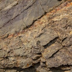 Granite background for design. Rough cracked mountain surface