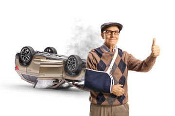 Elderly man with a broken arm wearing a splint and gesturing thumbs up in front of an accident...