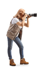 Full length shot of a female photographer taking a photo