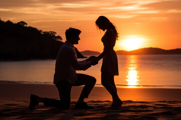 Silhouette of a Romantic Beach Proposal at Sunset