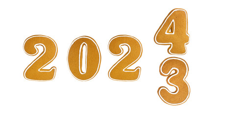 Flipping the numbers 2023 to 2024. Baked gingerbread numbers with gingerbread cookies. The concept...