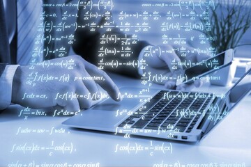 male hands on laptop keyboard with mathematical formulas