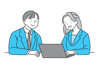 相談しながら仕事するスーツの男女