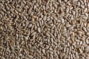 Peeled Sunflower Seeds Background: A Culinary Canvas of Shell-free Sunflower Seeds, Creating a Lively and Textured Background for Gourmet Cooking - Top View, Flat Lay