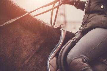 Atmospheric photo of a horse rider. Horse riding school. Equestrian theme. - 688820364