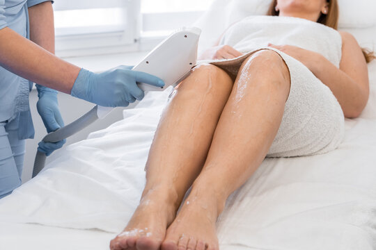 A step towards perfect skin, where the photo shows the process of laser hair removal in beauty salon, which woman organized for herself during a vacation. Professional care at specialist cosmetologist
