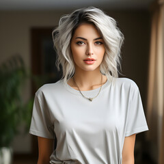 A woman wearing a gray t-shirt suitable for print-on-demand customization