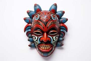 Naklejka premium Carnival mask for the festival. African ethnic ritual mask isolated on a white background. Wooden Tribal Mask of warrior with carved ornaments. Traditions and customs of Africa. Travel souvenir