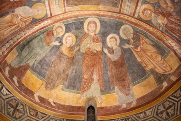 Fotobehang TREVISO, ITALY - NOVEMBER 8, 2023: The fresco of benedicting Jesus among the apostles in the church Chiesa di San VIto e Santa Lucia from 13. cent.  © Renáta Sedmáková