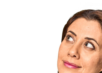 Obraz premium Smiling woman looking aside in studio portrait