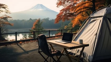 Fotobehang outdoor office near camping tent at Mount Fuji of businessman while traveling on holiday. © ANEK