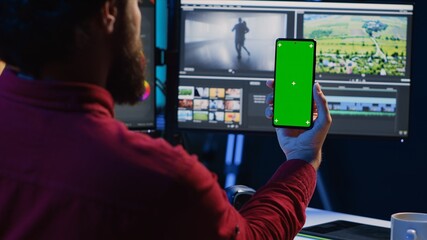 Video editor following tutorial on green screen smartphone, learning to select key frames to use in...