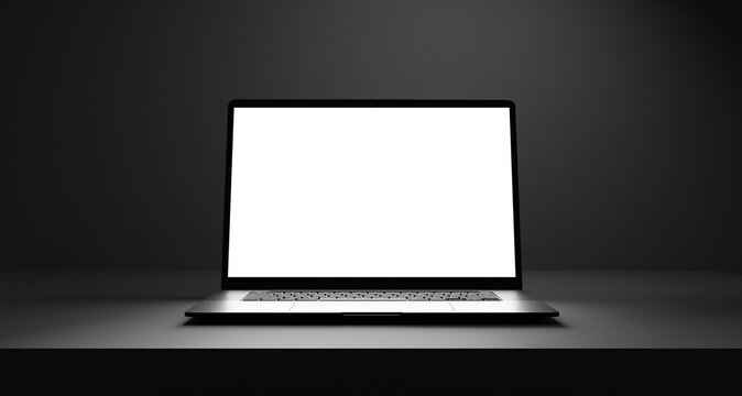 Laptop with white empty blank screen mock up on black table and dark black wall backdrop, empty white screen place for design and advertisement, black room table and laptop background mock up