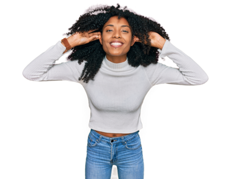 Young african american girl wearing casual clothes smiling pulling ears with fingers, funny gesture. audition problem