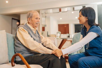 Tender home nurse attending an old man