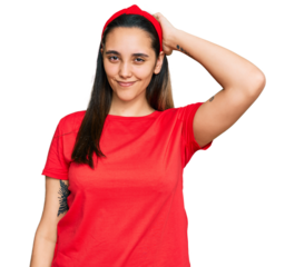Young hispanic woman wearing casual clothes confuse and wonder about question. uncertain with doubt, thinking with hand on head. pensive concept.