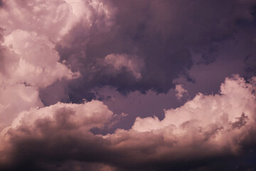 Dramatic gloomy sky with storm clouds. Gray blue purple pink white skies background. Stormy rain...