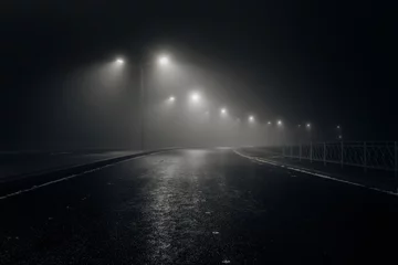 Fotobehang Foggy misty night road illuminated by street lights © Mulderphoto