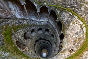 The ceremonial Initiation Well and spiral staircase into the underground tunnel system seen from...