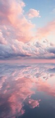 Naklejka premium Light pink clouds in sunset blue sky. Pastel colors of clouds, sunrise sundown natural dreamy background for a product, wallpaper for a screen lock, banner