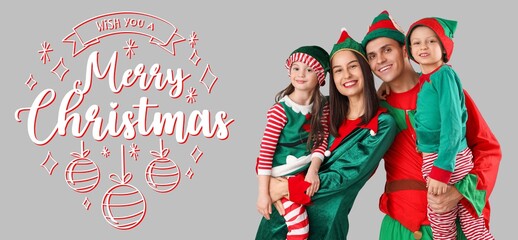 Happy family in elf's costumes on grey background. Merry Christmas