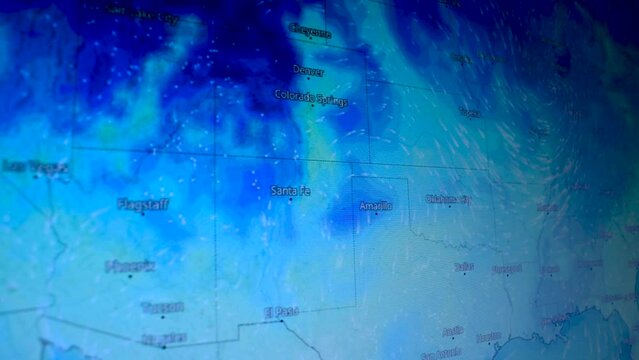 Cold weather wave over USA North America Shot of a computer screen. Weather satellite view map. Precipitations, temperatures, air pressure. Meteorology live view countries continents.