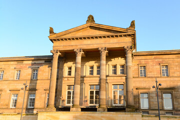View of beautiful old building with windows in city