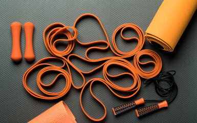 orange black fitness background with accessories
