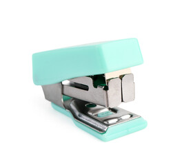 Green stapler isolated on white background