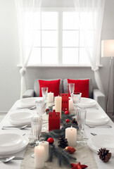 Festive table setting with Christmas decor at home