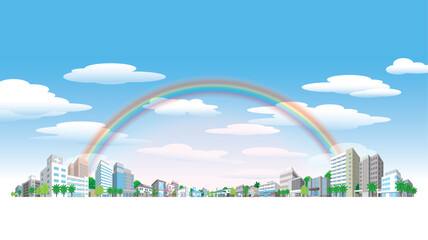 虹がかかった空と街並みのイラスト.