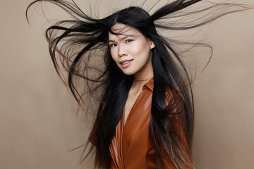 Woman hair femininity glamour beautiful model fashion beige portrait salon asian cosmetic beauty