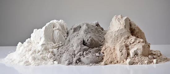 Foto op Canvas White mud, clay, and volcanic ash extracted from a kaolin mine. © AkuAku
