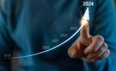 Human with 2024 new year business financial investment data, business growth, action plan for...