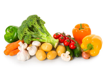 Fresh vegetables with mushrooms on white background
