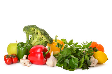 Fresh vegetables and fruits with parsley on white background