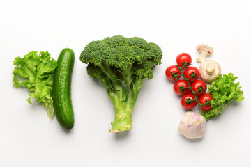 Fresh vegetables with mushrooms on white background