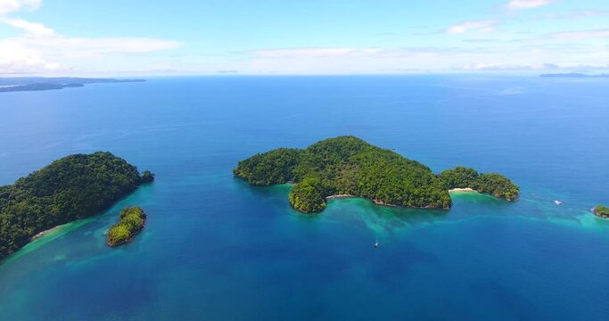 High above Isla Afuera, a small secluded island that is part of a Panamanian archipelago on a beautiful summer day in paradise