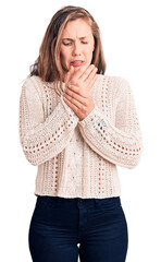 Young beautiful blonde woman wearing casual sweater suffering pain on hands and fingers, arthritis inflammation