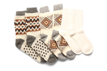 Different warm socks on white background