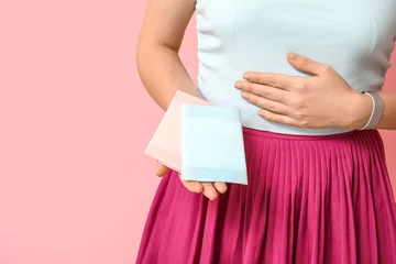 Foto op Canvas Young woman with menstrual pads on pink background, closeup © Pixel-Shot