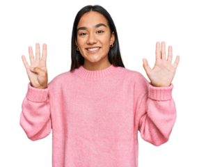 Young asian woman wearing casual winter sweater showing and pointing up with fingers number nine while smiling confident and happy.