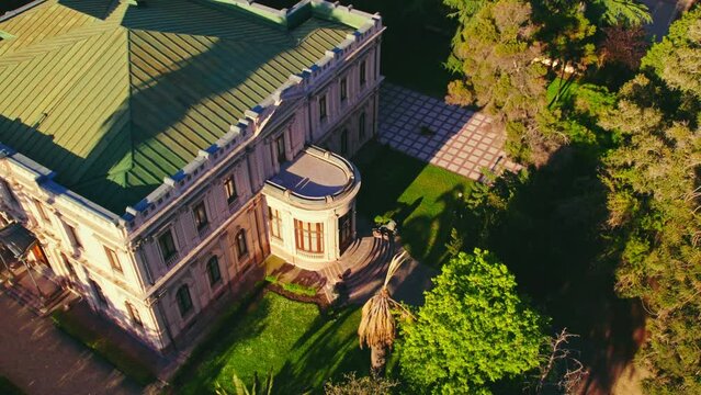 Scenic Drone Flyover Historic Cousino Palace With Green Native Gardens, Santiago