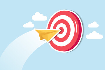 Business goal or target, challenge or improvement to achieve success, win business competition or motivation concept, paper plane origami flying through dartboard or archer bullseye target.