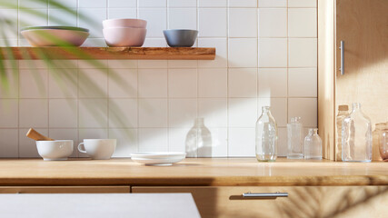 Fototapeta na wymiar A sunny kitchen with white tile walls, a wooden table and sink.
