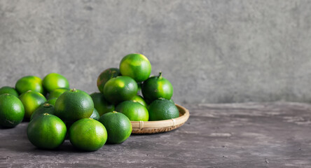 Fresh tangerines on gray background