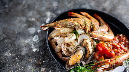 Pan-fried shrimp, mussels, and vegetables